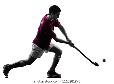 one caucasian field hockey player man isolated silhouette on white background - Powered by Shutterstock