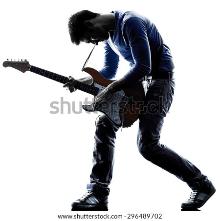 one caucasian man electric guitarist player playing in studio silhouette isolated on white background