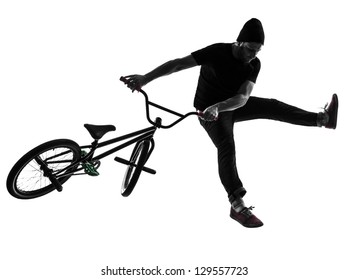 one caucasian man exercising bmx acrobatic figure in silhouette studio isolated on white background - Powered by Shutterstock