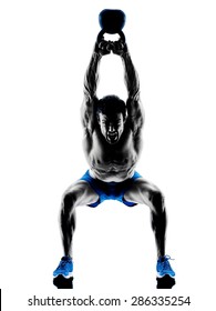 one caucasian man exercising fitness Kettle Bell weights exercises in studio silhouette isolated on white background