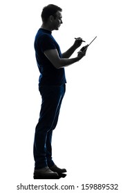 One Caucasian Man Holding Digital Tablet   In Silhouette On White Background