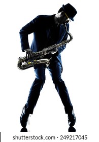 one caucasian man  saxophonist playing saxophone player in studio silhouette isolated on white background - Shutterstock ID 249217045