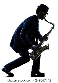 One Caucasian Man  Saxophonist Playing Saxophone Player In Studio Silhouette Isolated On White Background