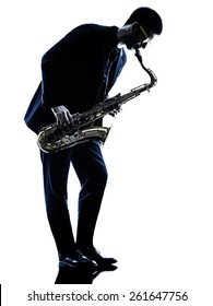 One Caucasian Man  Saxophonist Playing Saxophone Player In Studio Silhouette Isolated On White Background