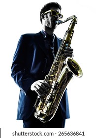 One Caucasian Man  Saxophonist Playing Saxophone Player In Studio Silhouette Isolated On White Background