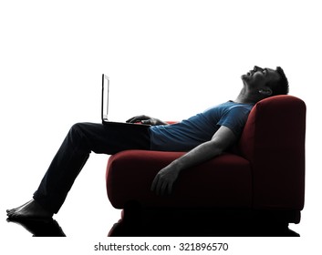 One Caucasian Man Sofa Couch Computer Computing Laptop Sleeping In Silhouette Isolated On White Background