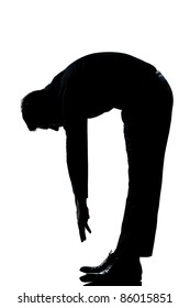 One Caucasian Man Stretching Back Full Length Silhouette In Studio Isolated White Background