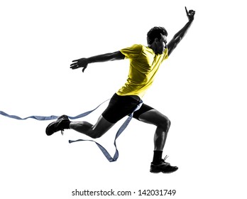 One Caucasian Man Young Sprinter Runner Running  Winner At Finish Line  In Silhouette Studio  On White Background