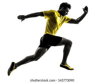 One Caucasian Man Young Sprinter Runner Running  In Silhouette Studio  On White Background