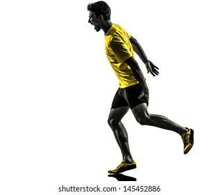 One Caucasian Man Young Sprinter Runner Running Muscle Strain Cramp In Silhouette Studio  On White Background