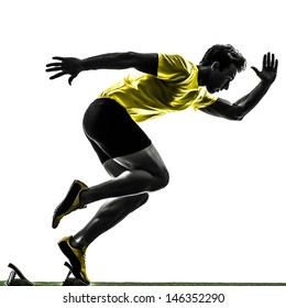 One Caucasian Man Young Sprinter Runner  In Starting Blocks  Silhouette Studio  On White Background