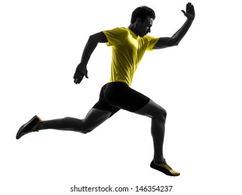 one caucasian man young sprinter runner running  in silhouette studio  on white background