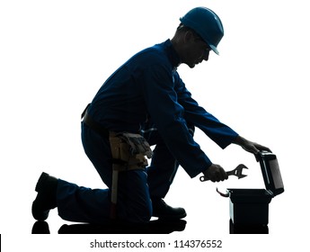 One Caucasian Repairman Worker Silhouette In Studio On White Background