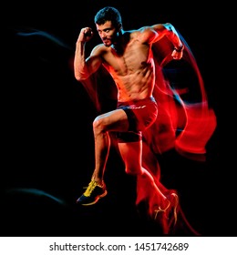 One Caucasian Topless Muscular Mature Man Runner. Running Jogger Jogging Isolated On Black Background With Light Painting Speed Mouvement Effect