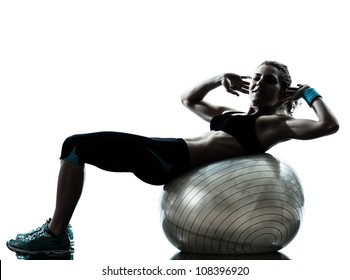 one caucasian woman exercising fitness ball workout posture in silhouette studio isolated on white background - Powered by Shutterstock