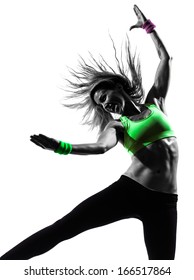 one caucasian woman exercising fitness zumba dancing in silhouette on white background