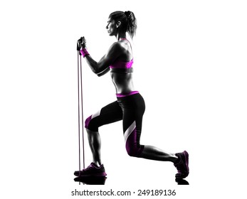 one caucasian woman exercising  fitness resistance bands in studio silhouette isolated on white background