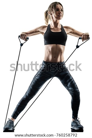 Similar – Rear view portrait of one young athletic woman at crossfit training, exercising with trx suspension fitness straps over dark background