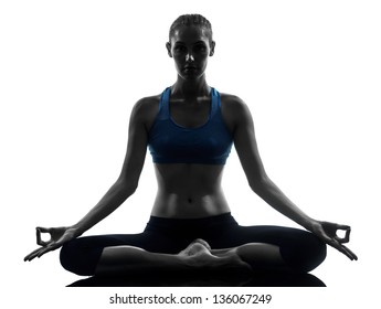 One Caucasian Woman Exercising Yoga Meditating In Silhouette Studio Isolated On White Background