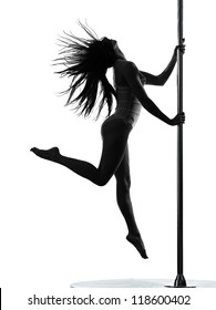 one caucasian woman pole dancer dancing in silhouette studio isolated on white background