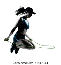 One Caucasian Woman Runner Jogger Jumping Rope In Silhouette Studio Isolated On White Background