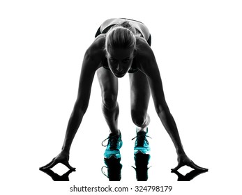 One Caucasian Woman Runner Running Jogger Jogging On Starting Blocks  In Studio Silhouette Isolated On White Background