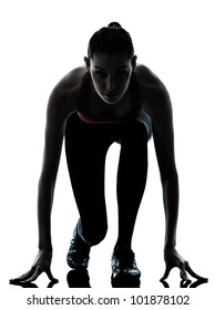 One Caucasian Woman Sprinter On Starting Block In Silhouette Studio Isolated On White Background