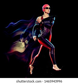 One Caucasian Woman Triathlon Triathlete Studio Shot Isolated On Black Background With Light Painting Effect