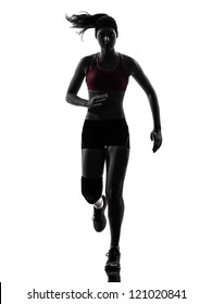 One Causasian Woman Runner Running Marathon  In Silhouette Studio Isolated On White Background