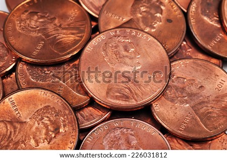 one cent coins isolated on white background