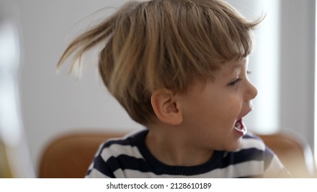 One Child Shakes Head And Hair Being Goofy And Fun