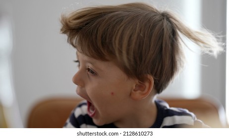 One Child Shakes Head And Hair Being Goofy And Fun