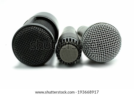 one condenser microphone and two dynamic microphones, isolated on white background Stock photo © 
