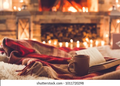 One Cup And A Book Near The Fireplace Winter Concept