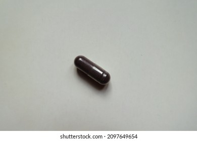 One Dark Purple Capsule Of Bilberry Extract Dietary Supplement