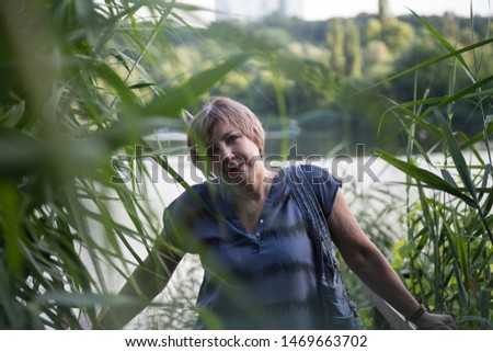 Similar – Foto Bild Portrait von einer jungen Frau im Bambus Dschungel