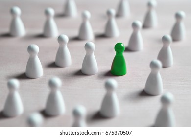 One different board game pawn. Individuality, independence, leadership and uniqueness concept. Stand out from the crowd. Think outside the box. Dare to be different. - Shutterstock ID 675370507