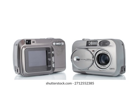 One digital camera isolated on white background, close-up.