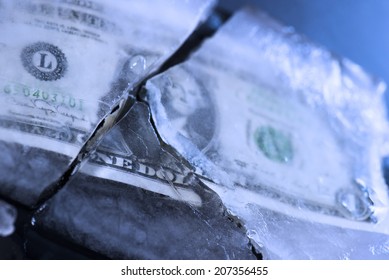 One Dollar Bill Frozen And Broken In Ice And Money Rended.