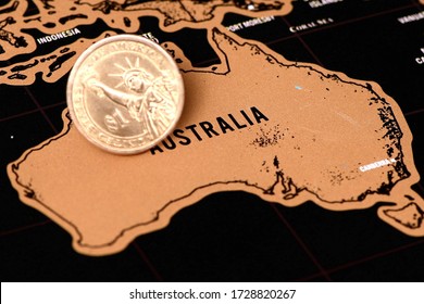One Dollar Coin On Black Scratch Travel Map Of Australia, Sidney