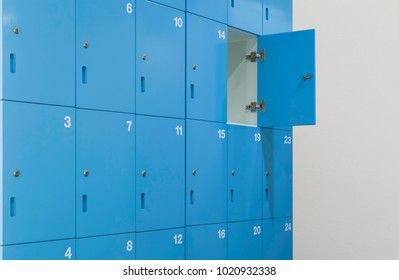 One Door Of Blue Locker Open Inside School Restroom