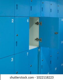 One Door Of Blue Locker Open Inside School Restroom