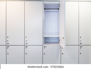 One Door Open Of Set White Locker Inside School Restroom