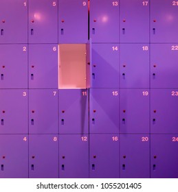 One Door Of Purple Locker Open Inside School Bathroom