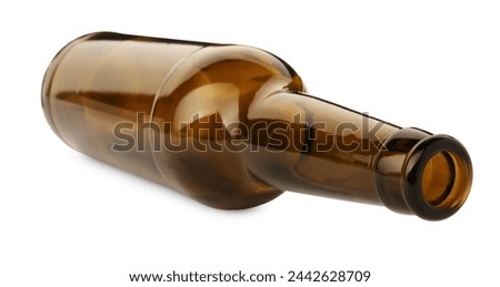 One empty brown beer bottle isolated on white