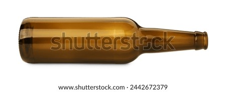 One empty brown beer bottle isolated on white