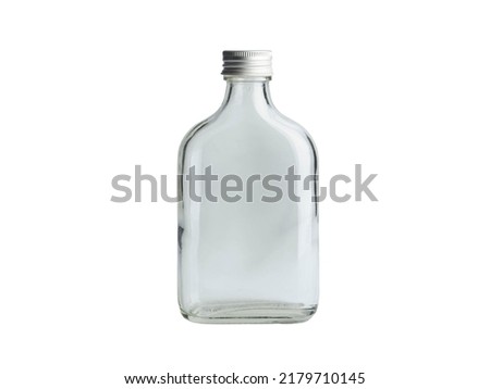 One empty glass russian vodka bottle with black cap isolated on a white background