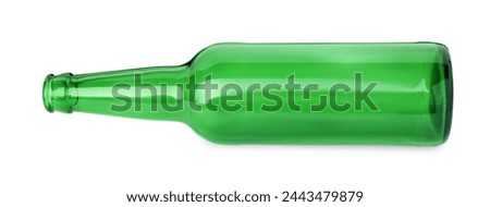One empty green beer bottle isolated on white