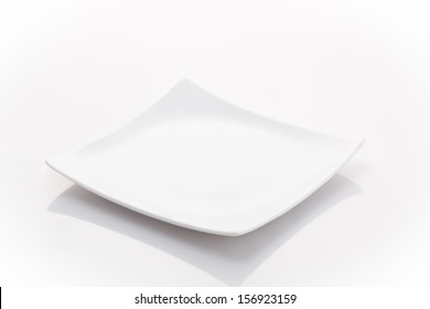 one empty square plate isolated on a white background - Shutterstock ID 156923159
