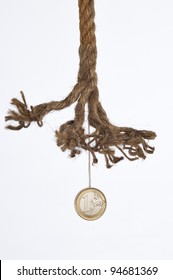 One Euro Coin Hanging By A Frayed Rope